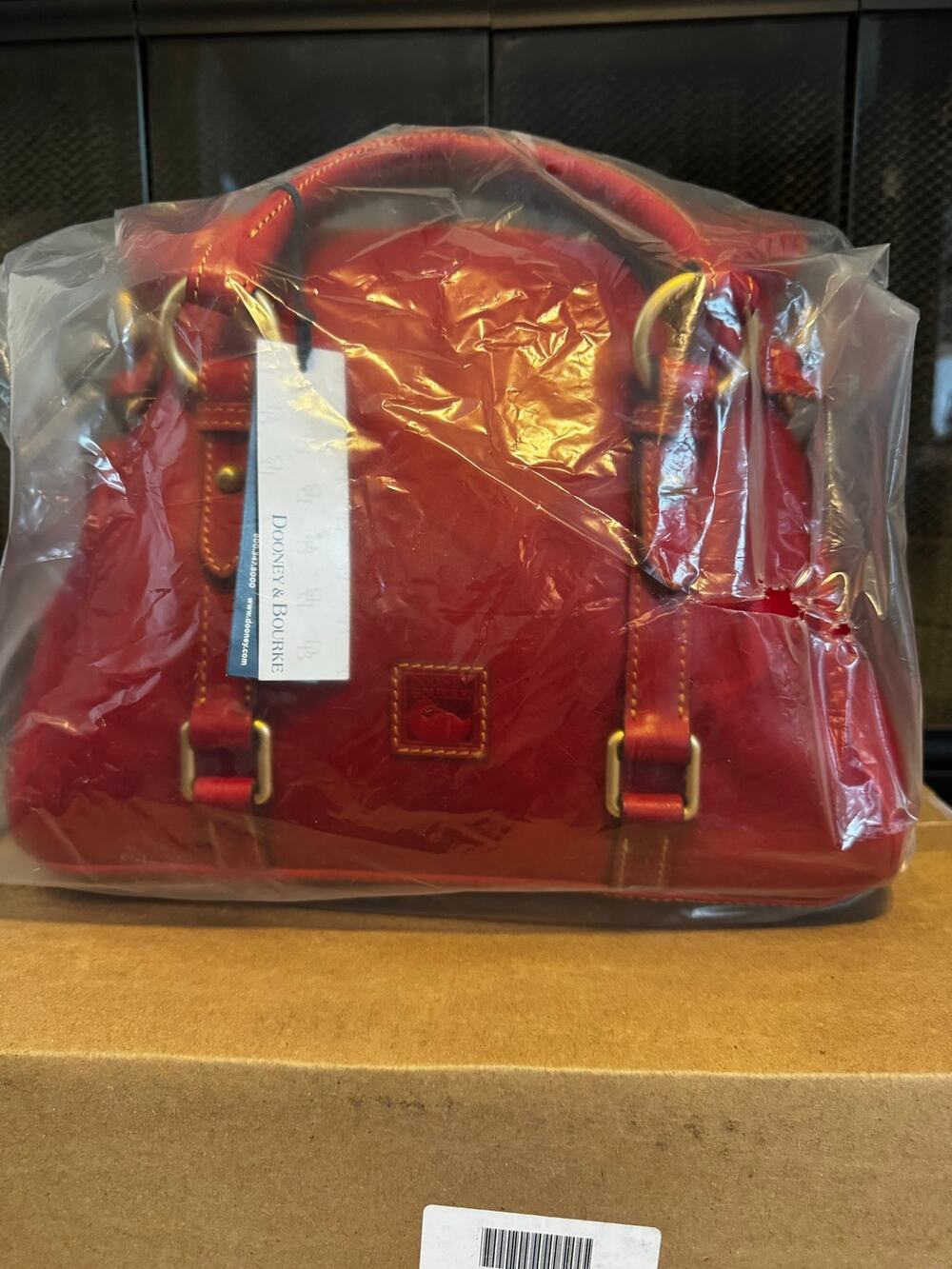 Iconic Dooney and Bourke red Florentine satchel with bag and tags